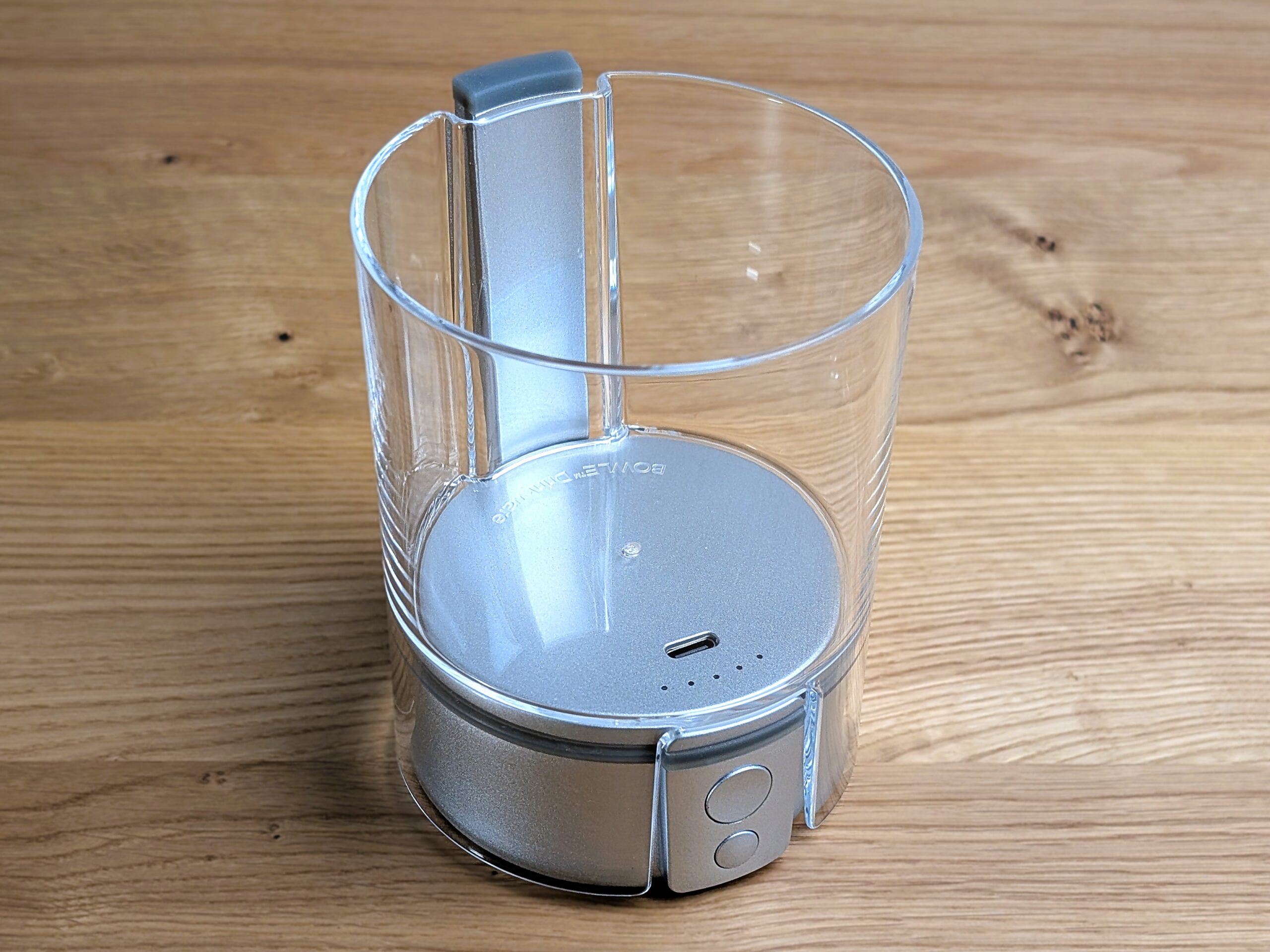 The Tafée Bowle vaporizer sitting on a wooden table.