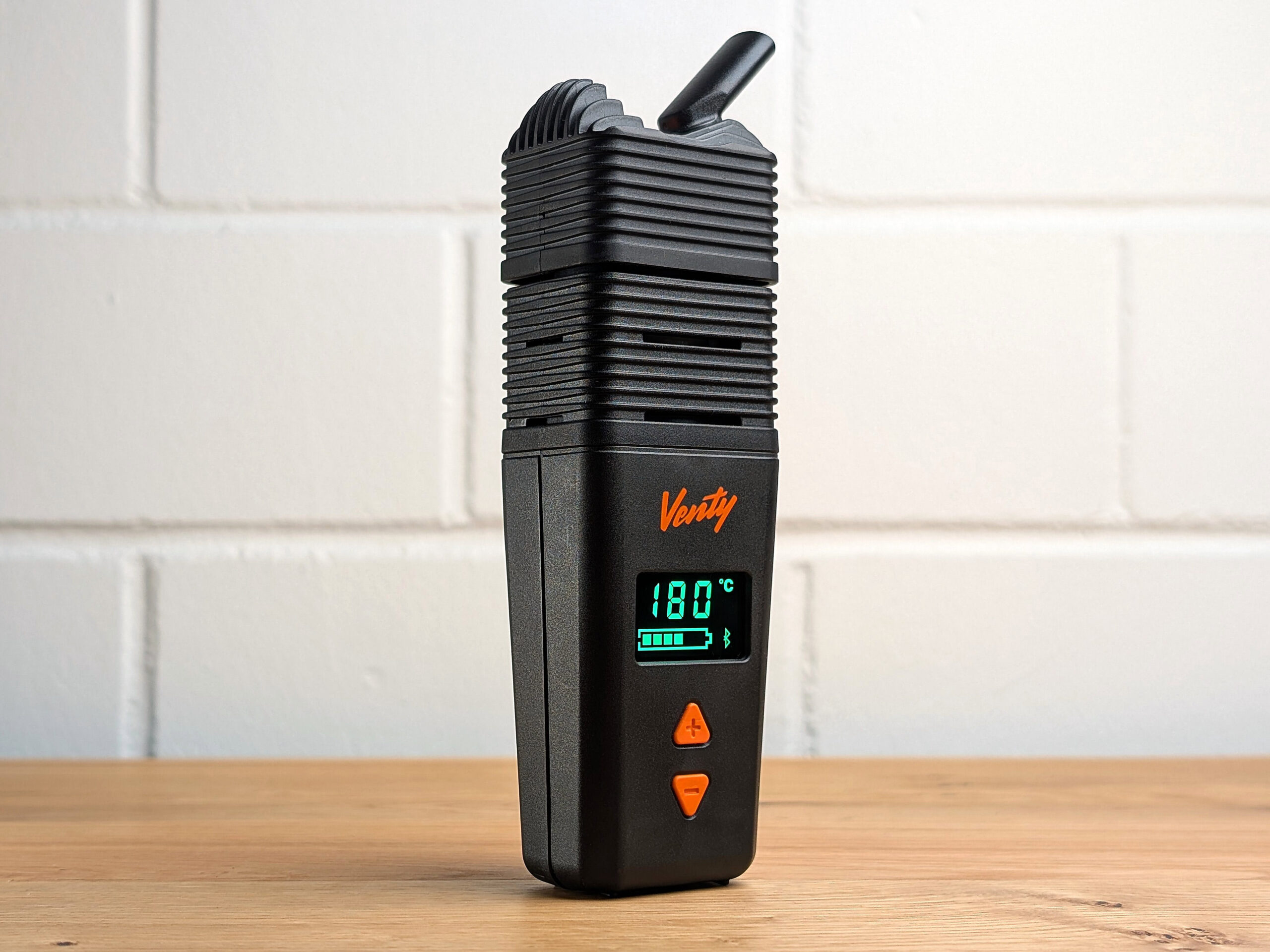 Venty portable vaporizer with angled display in green