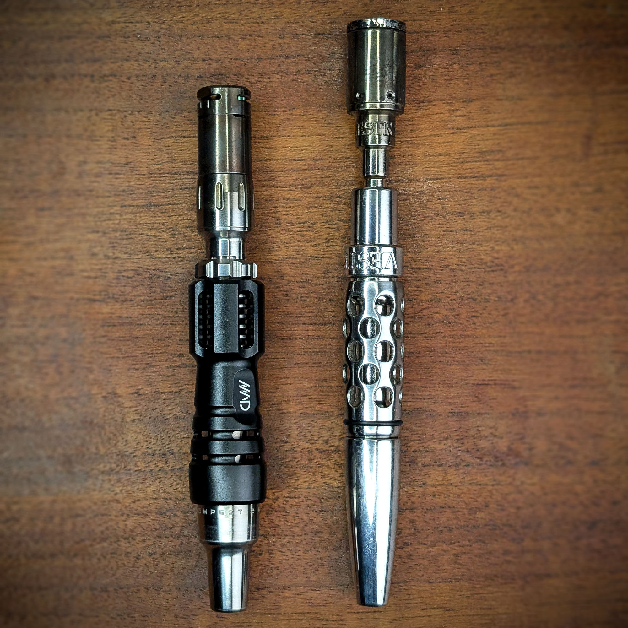 The Mad Heaters Tempest 2 and the Vestratto Tornado are lying on a wooden table.