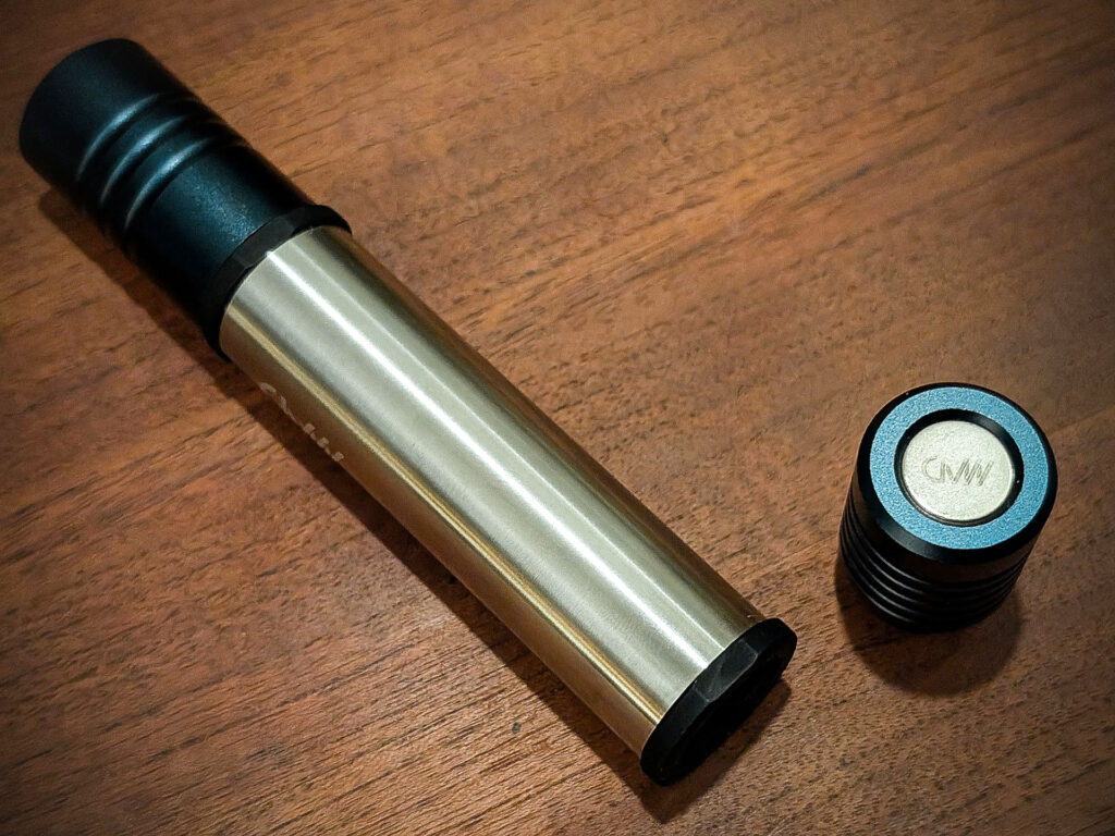 The Tempest Case lying open on a wooden table. The magnetic top of the lid is facing the viewer.
